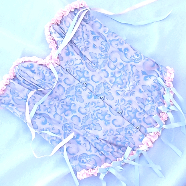 A corset or bustier top photographed for a US resale listing in September 2026